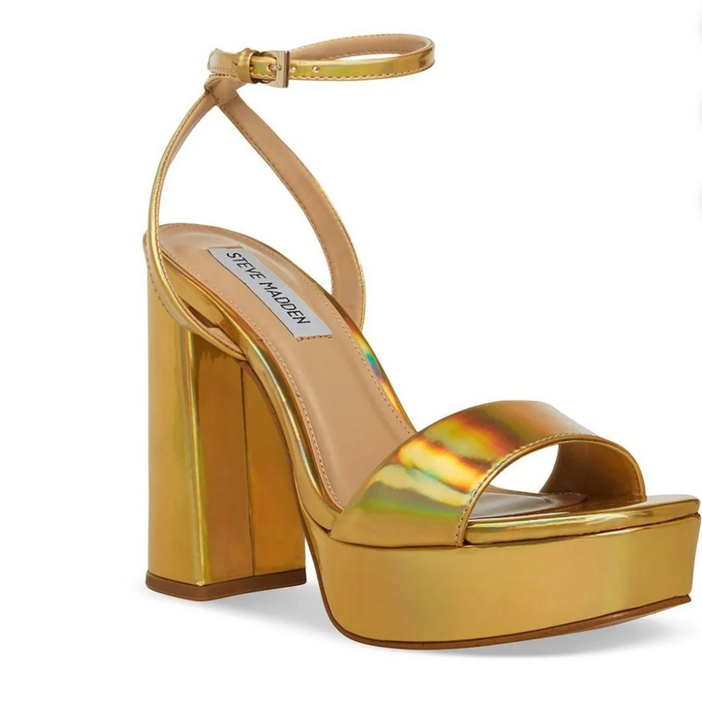 STEVE MADDEN LESSA platform sandal with a towering heel & feminine ankle strap.